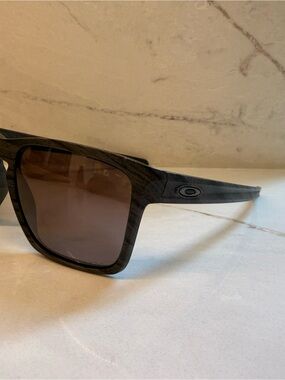 Oakley Matte Gray Woodgrain Frame Sunglasses with Brown Lenses